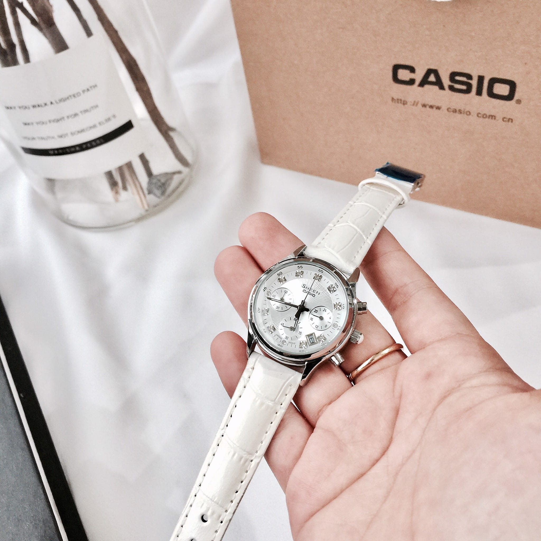 Casio Casio Sheen SHE-5023L-7A женские часы белый циферблат на запястье